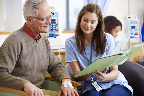 Nurse showing chart to patient