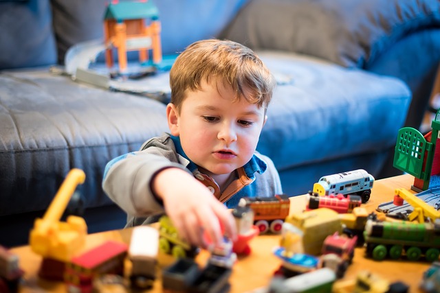 Boy with Thomas and friends toys